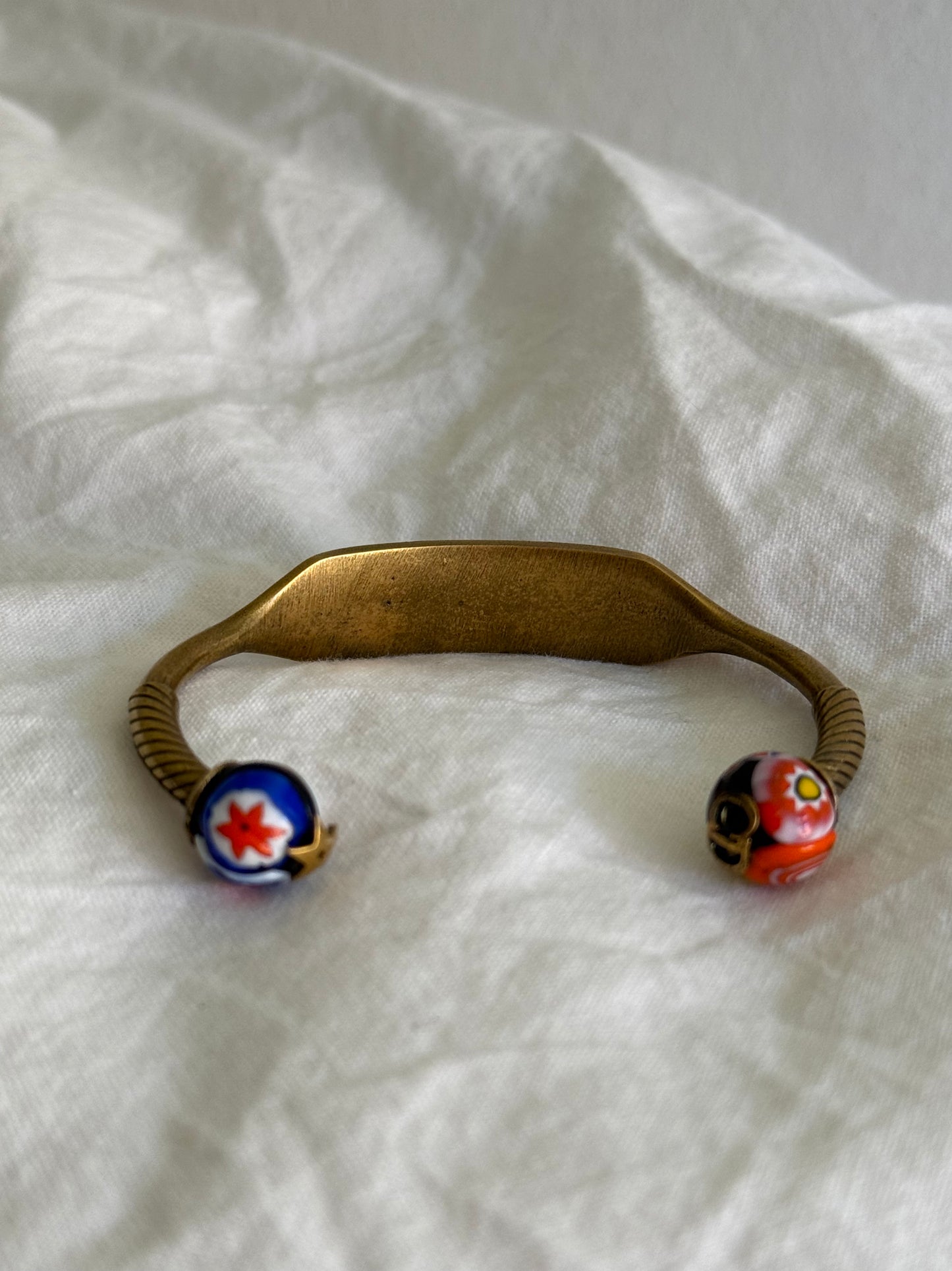 Dior Logo Cuff Bracelet With Star Detail in Antique Gold-Finish Metal