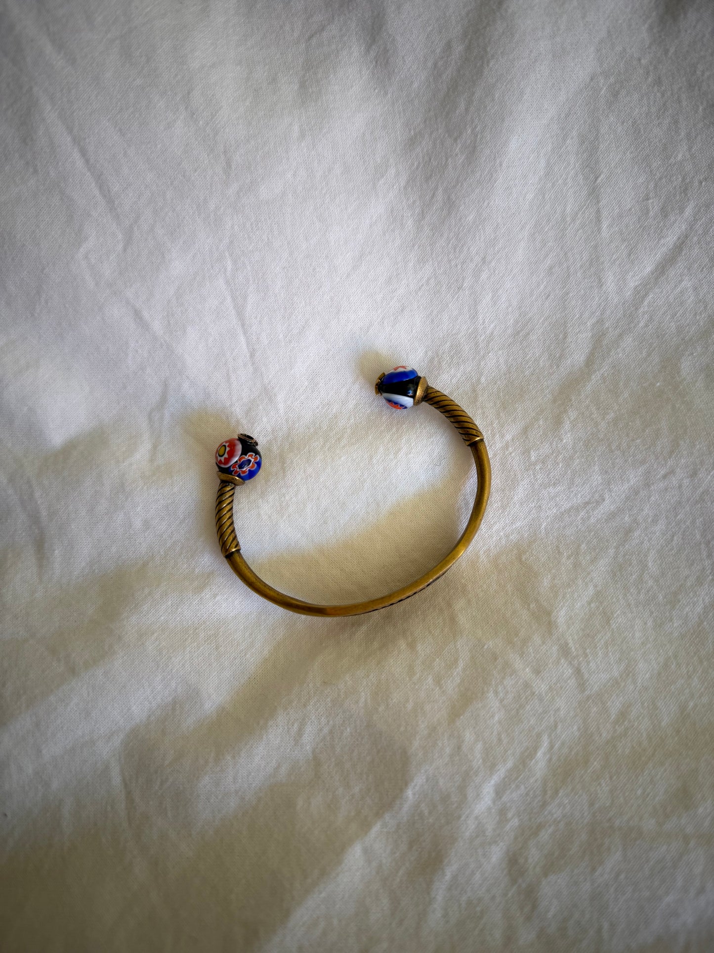 Dior Logo Cuff Bracelet With Star Detail in Antique Gold-Finish Metal