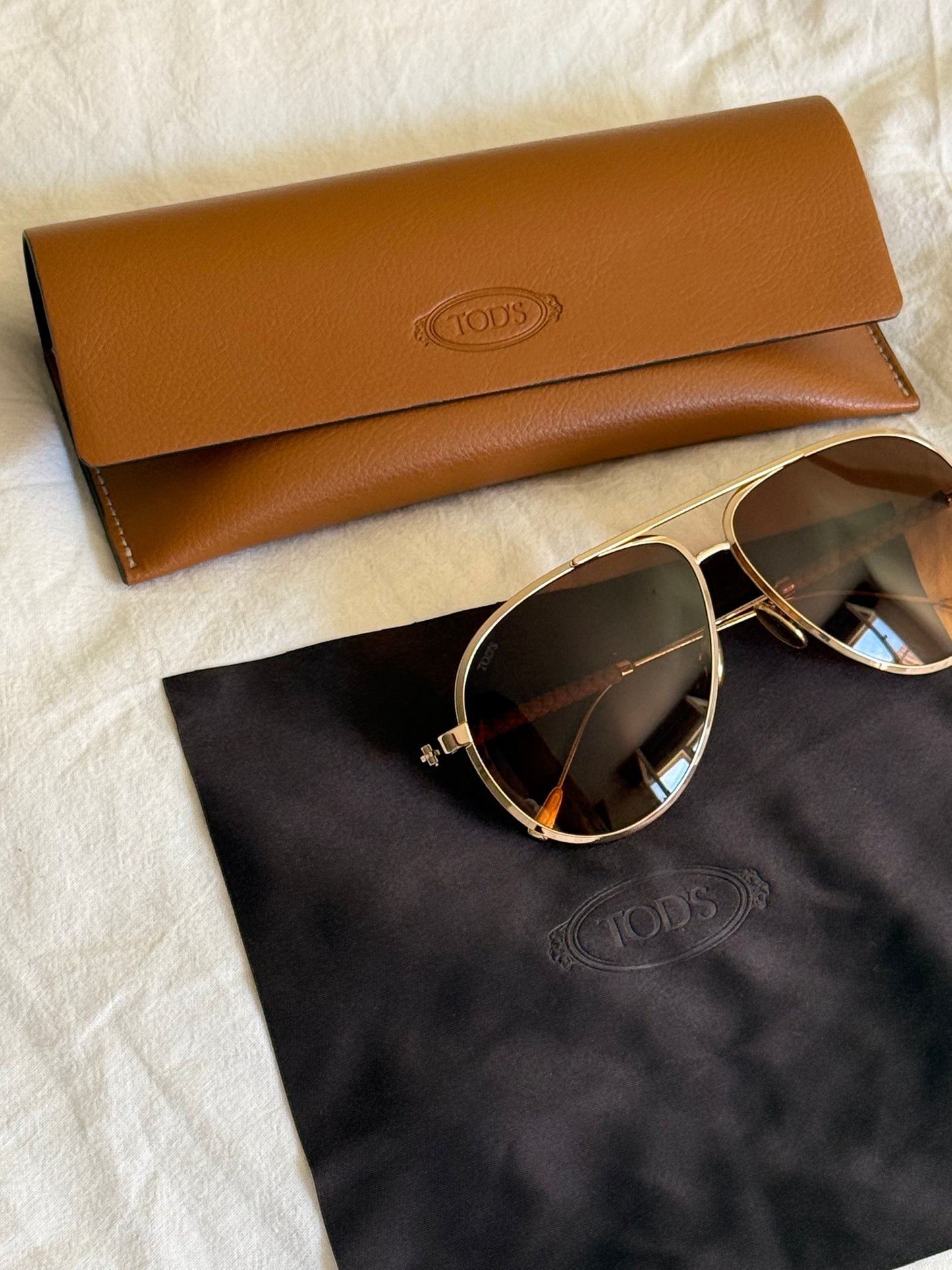 Tod’s Teardrop Sunglasses with Temples in Leather